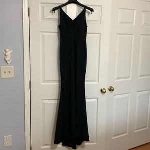 Womens V neck sleeveless black evening gown. Size “2”. 94% polyester 6% spandex